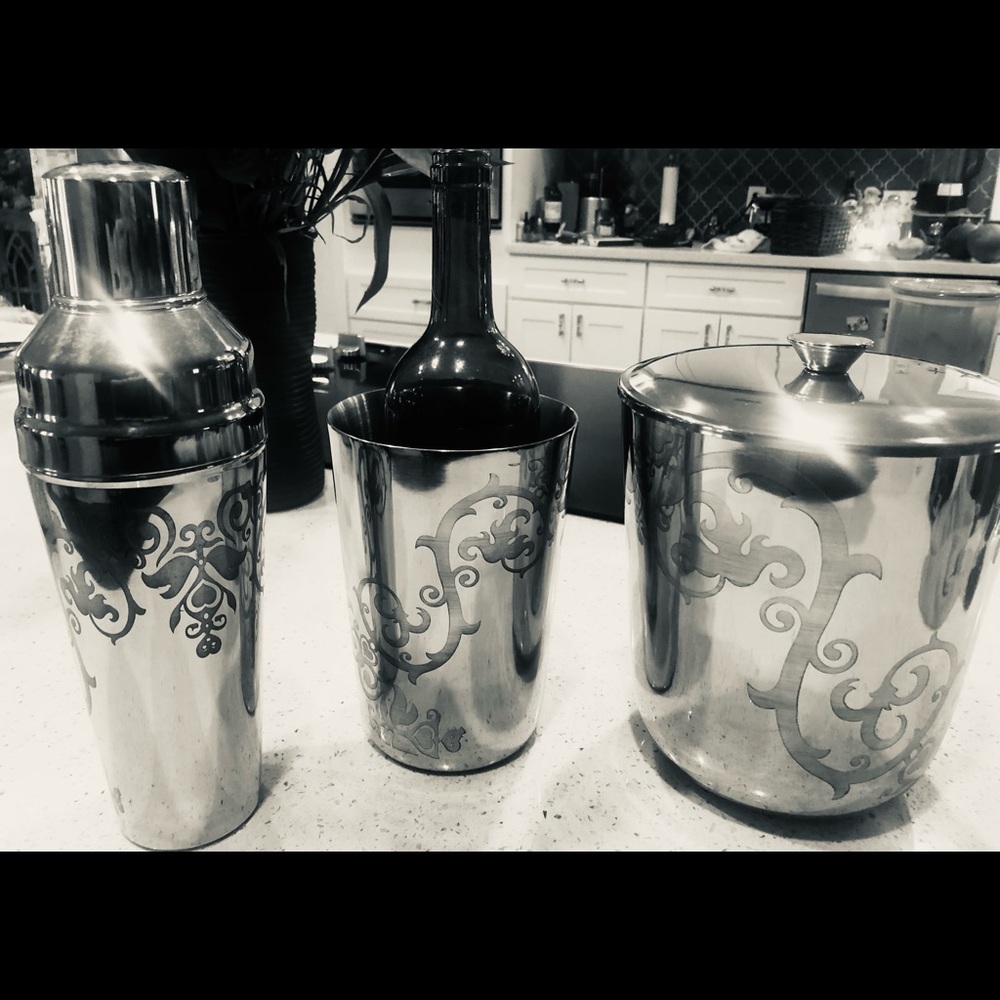 Polished stainless steel scrolled bar set